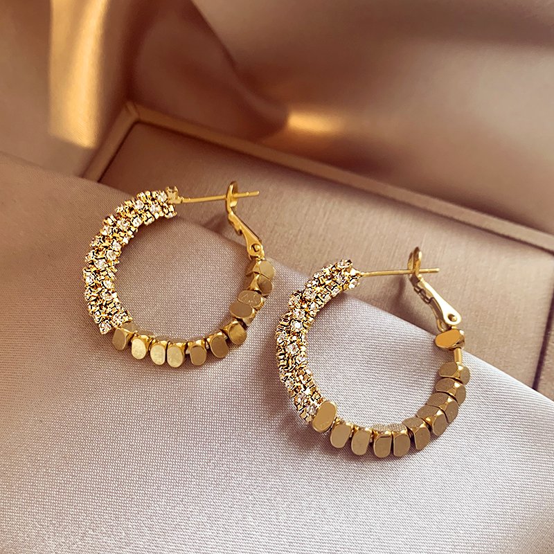 Broken silver unique gold circle earrings, niche, light luxury, high-end feeling earrings, summer 2024 new popular earrings