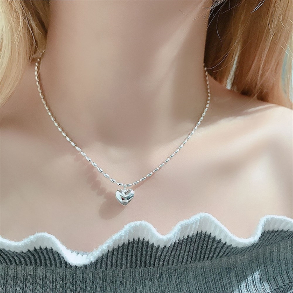Women's Pure Silver Rice Bead Chain with Heart-Shaped Pendant - Fashionable Collarbone Necklace for Light Luxury and High-End Style
